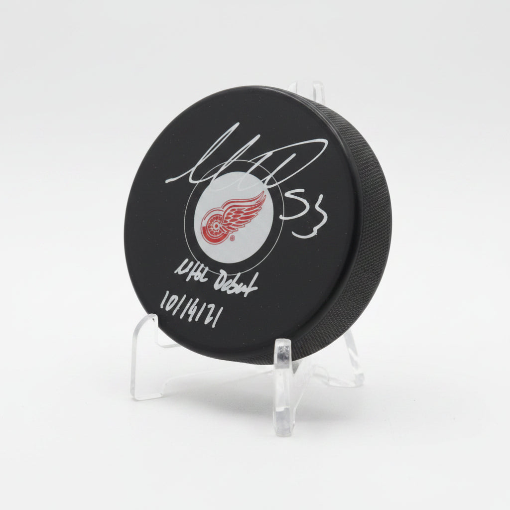 Moritz Seider Autographed Detroit Red Wings Puck w/NHL Debut And COA