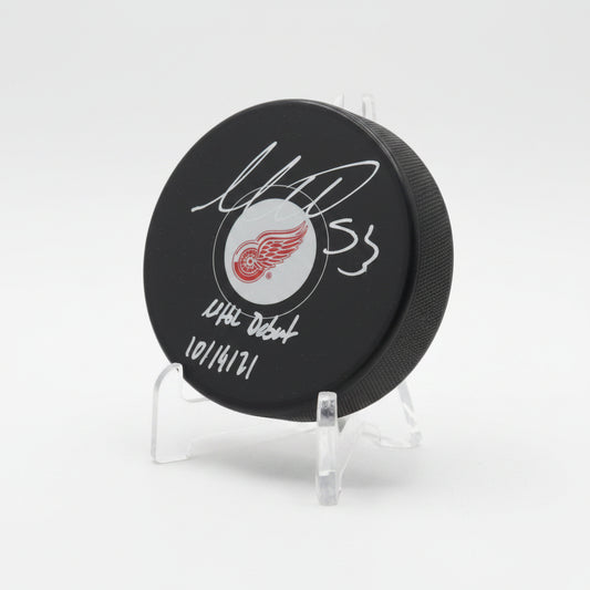 Moritz Seider Autographed Detroit Red Wings Puck w/NHL Debut And COA