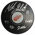 Mathieu Dandenault, Three-Time Stanley Cup Champion, Autographed Puck With Beckett Authentication
